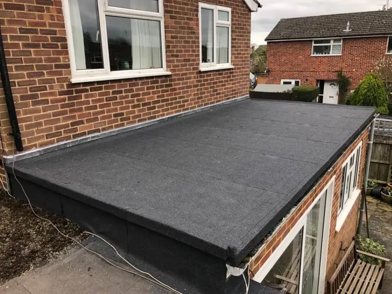 Emergency roof repair being carried out after storm damage