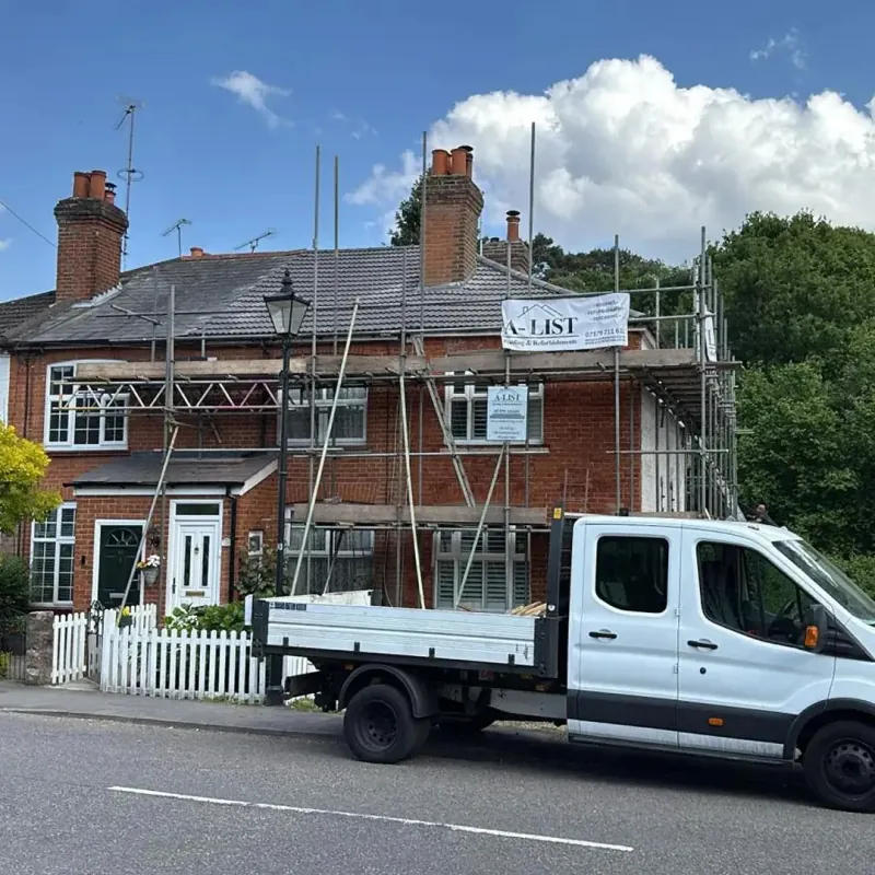 Finished slate and tile roofing on a detached property